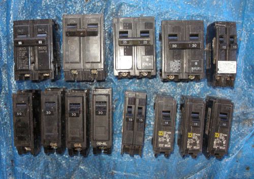 Lot of 15 circuit breakers 15, 30 60, 50 amp GE breakers dual pole  + 220v plug