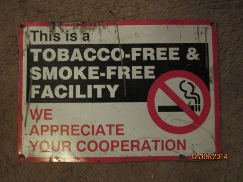 tobacco free and smoke free facility metal sign
