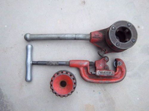 USED RIDGID NO. 1-2 PIPE CUTTER, RATCHETING THREADER AND 2 DIES