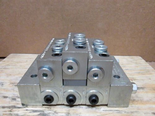 New graco trabon lubriquip modular divider valve 3 port manifold msp-40s/20s/20s for sale