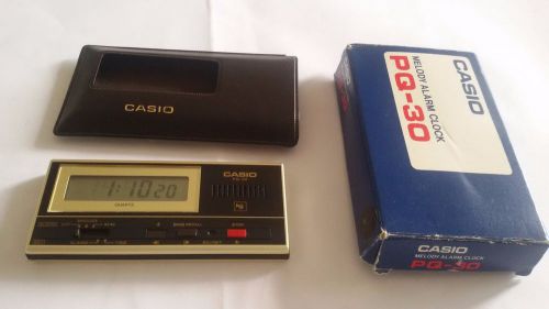 Vintage Pocket LCD Casio PQ-30 Melody Alarm Clock with Pouch and box  rare