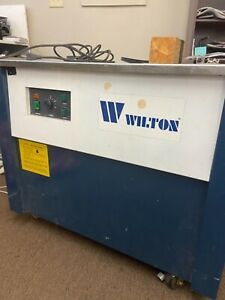 Wilton strapping machine