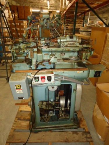 Beckler as-4 swiss screw machine w/3 drill stations &amp; 5 tool holders running for sale