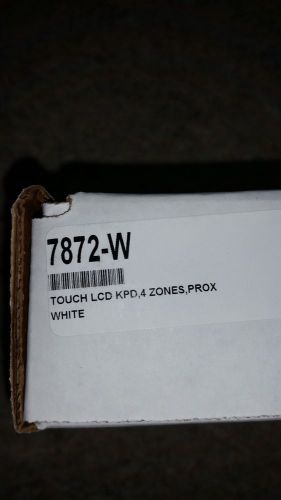 DMP 7872-W touchscreen keypad with 4 zones. New in box. Color white.