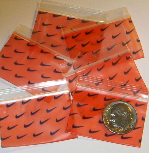 1000 Swoosh baggies 1.5 x 1&#034;  Mini ziplock bags  Apple 1510 orange/black