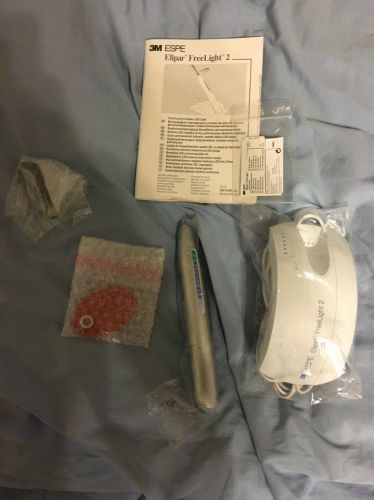 brand new and does not use light curing light 3M ESPE elipar freelight 2