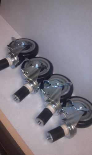 Stainless steel table caster set   5&#034; locking    1 set of 4 with brakes for sale