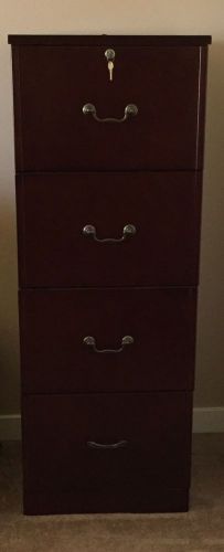 L@@K! Four drawer file cabinet. Cherry color, with lock