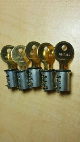 LOT OF (5) HERMAN MILLER LOCK CORES (NEW) #UM306. ALL WITH KEYS.