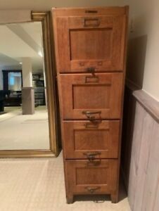 M.L. HIMMEL &amp; SON WOOD RAISED PANEL FOUR DRAWER FILE CABINET WITH BRASS HARDWARE