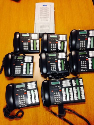 Nortel (8) t7316e phone lot with bcm50 telephone system for sale