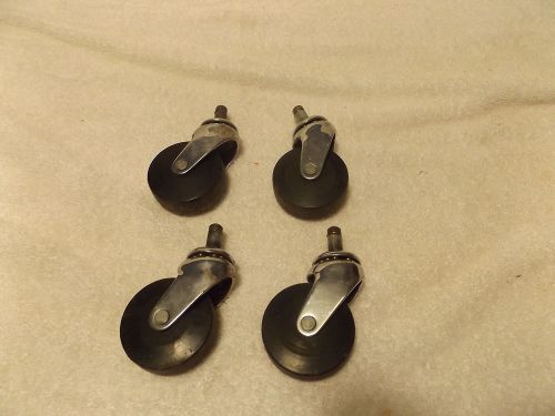 Set of 4 Vintage Casters with 2 1/8&#034; Hard Black Plastic Wheels