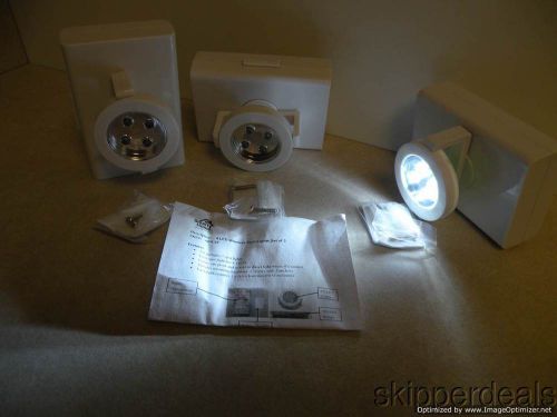 3 spot lights each 4 led wireless that pivot &amp; swirl white battery operated new for sale