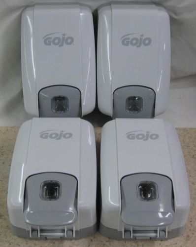 Four (4) gojo two-tone gray  lotion - soap dispenser for sale