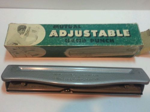 Adjustable metal hand punch by Mutual can do 2 or 3 holes