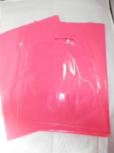 50 Hot Pink 9x12 Retail Merchandise Gift Bags With Cut Out Handles, Low density