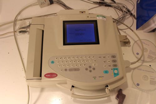 GE Mac 1200 Interpretive EKG Machine with cables 30 day warranty