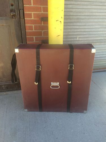 Twenty red cushioned vintage shipping storage cases with straps for sale
