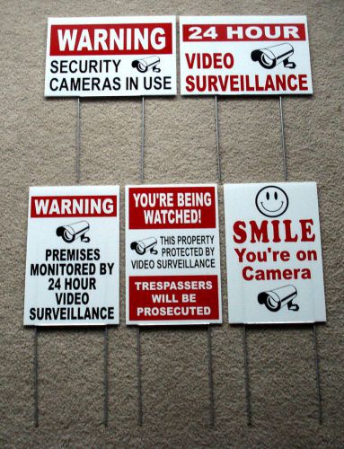 (5) assorted  24 hour video surveillance  security signs 8x12 with stakes  new for sale