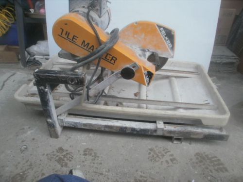Felker Wet Tile Saw with a 10&#034; Blade and 3/4 HP Motor    2 Tubs of Mastic