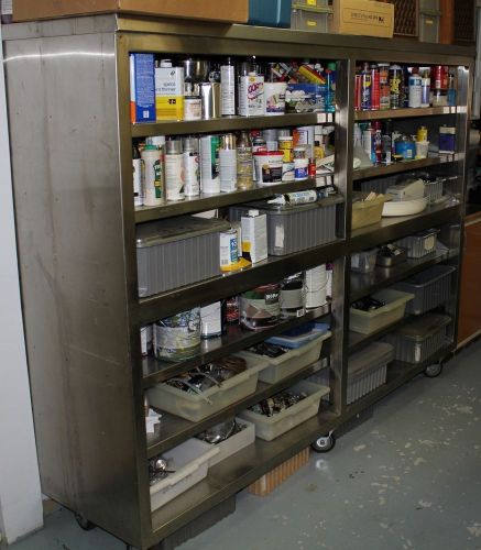 Stainless steel rolling shelf system on 6 very heavy duty casters. 96&#034; x 23.5&#034; for sale