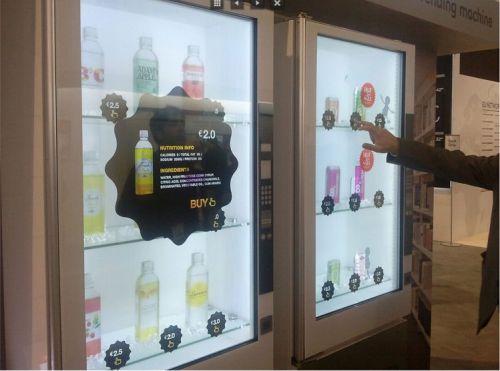 New wifi touch vending machine with 50inch touch transparent advertising door for sale