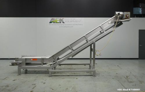 Used- Inclined Conveyor. Approximately 204&#034; long, 24&#034; wide pleated conveyor (3&#034;