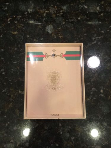 gucci note pad, pen , and stickers