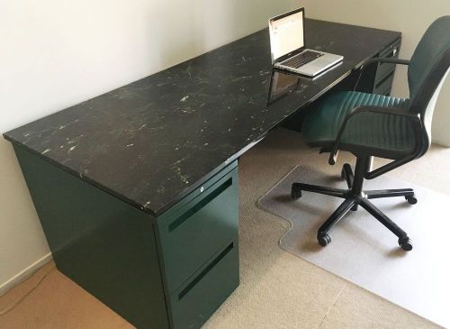 Slab of Italian marble, set on two file units to make an impressive desk