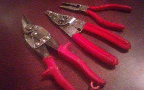 Snap-on lot of wire strippers, pliers, and tin snips!