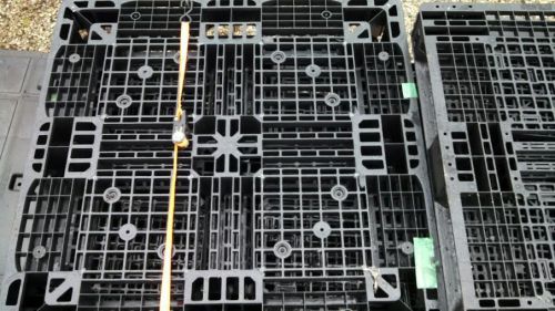 21 Plastic pallets skids, 43 1/4&#034; x 40&#034; x 5 3/4&#034; black