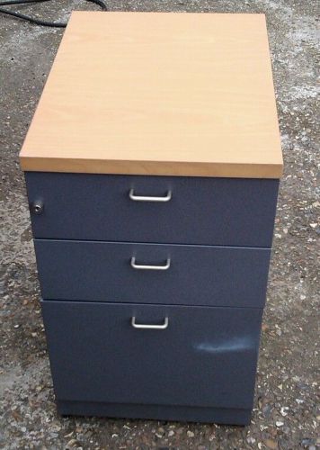 Metal 3 drawer steelcase under desk pedestal with wooden surface. for sale