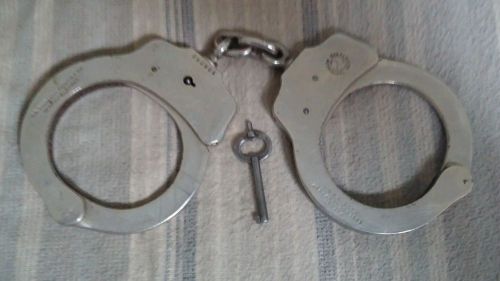 Vintage peerless handcuffs co. pat # 1531451-1872857 with original key for sale