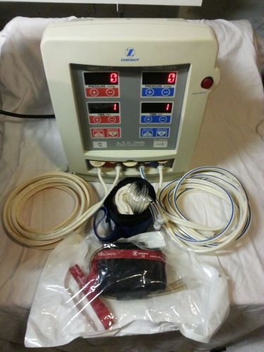 Zimmer ATS 2000 tourniquet with hoses, disposable cuffs, and new batteries.