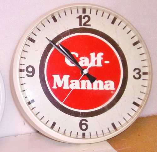 Vintage &#039;&#039;calf manna&#039;&#039; wall clock 12&#039;&#039; battery ganeva clocks chaney, wi. works for sale