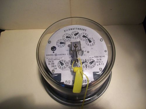Old General Electric glass 9 dial Kilowatthours / Demand Meter.