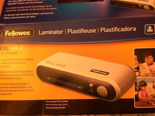 ID laminator that includes teslin paper, holographic overlays, and laminates