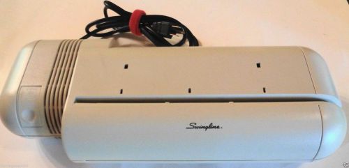 Swingline:  Electric 2-HOLE PUNCH  -  Commercial Grade