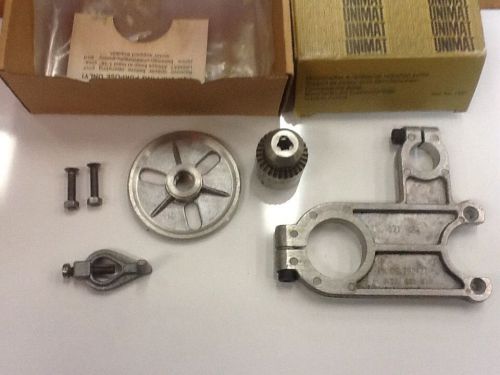 Unimat lathe parts lot. Face plat, drill chuck, and motor bracket.