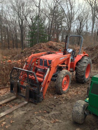 Kubota m5400 utility tractor with loader,brush cutter,harrow for sale
