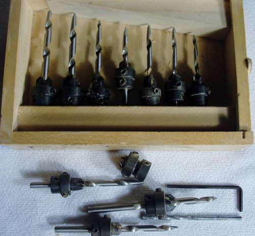 USED  33 PC ADJUSTABLE DEPTH STOP COLLARS COUNTERSINK W/WOOD CASE