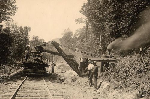 Photograph steam shovel laying railroad track in the woods 1900 for sale