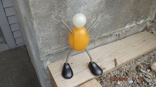plastic flexible human form mesage holder for desk top light up