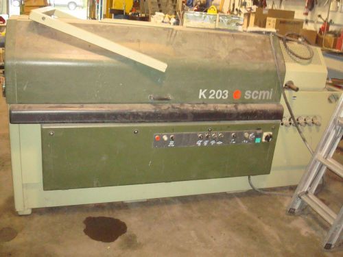 Scmi k203 single sided auto edge banding machine used 1998 for sale