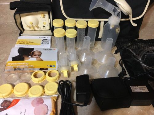 Medela pump in style advanced double breast pump + accessories and bottles for sale