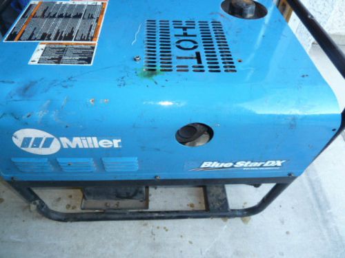 Miller model- 907590001 OM-4417145 DX portable welder/4500 watt generator