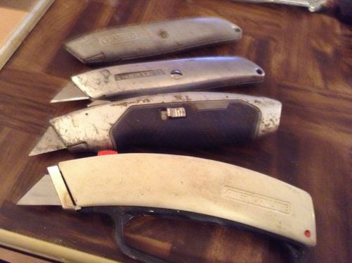 Lot of 4 assorted retractable razor knives