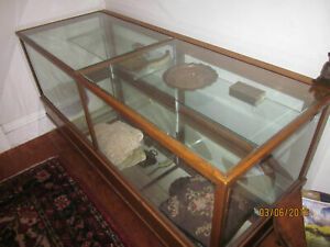 c.1850 Antique Golden Oak Display Case, original glass, iron legs