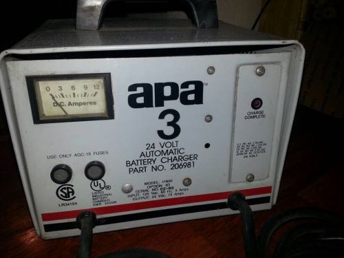 APA  3  BATTERY CHARGER 24 VOLTS 4 AMPS PART # 206981. USED.