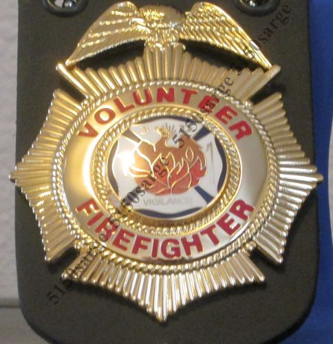 Gold volunteer firefighter badge, eagle top maltese cross shaped for sale